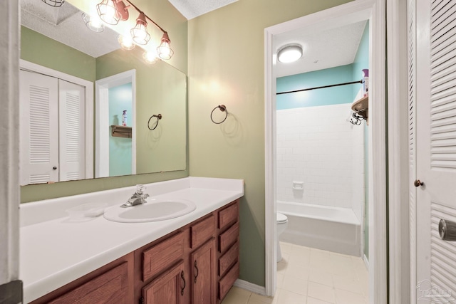 full bathroom with toilet, a textured ceiling, shower / bathing tub combination, tile patterned flooring, and vanity