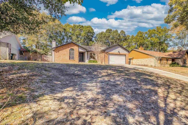 single story home with a garage