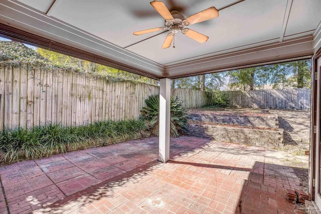 view of patio featuring ceiling fan