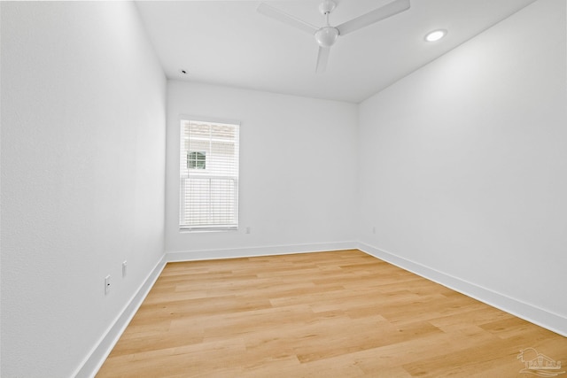 unfurnished room featuring hardwood / wood-style flooring