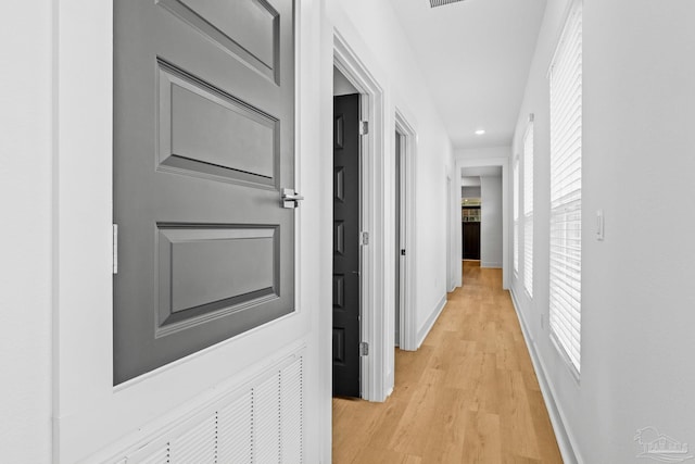 hall featuring light hardwood / wood-style flooring