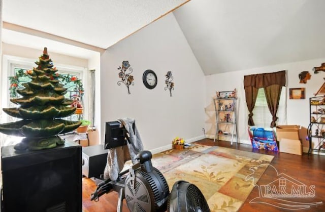 2738 Garcon Point Rd, Milton, FL 32583 - office area with lofted ceiling, wood finished floors, and baseboards