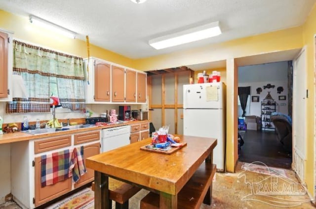 2738 Garcon Point Rd, Milton, FL 32583 - kitchen with white appliances, a textured ceiling, and a sink