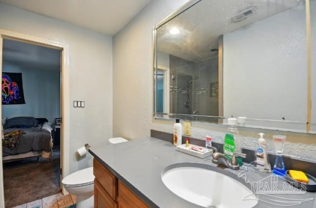 2738 Garcon Point Rd, Milton, FL 32583 - ensuite bathroom with a shower stall, vanity, and toilet