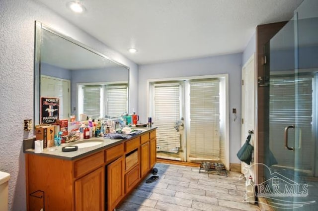 2738 Garcon Point Rd, Milton, FL 32583 - bathroom featuring double vanity and a stall shower