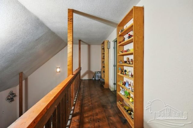 2738 Garcon Point Rd, Milton, FL 32583 - hall featuring a textured ceiling and lofted ceiling