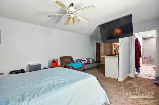 2738 Garcon Point Rd, Milton, FL 32583 - carpeted bedroom with ceiling fan and connected bathroom