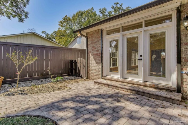 view of patio / terrace featuring fence