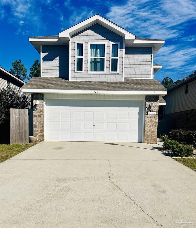 view of front of home with a garage