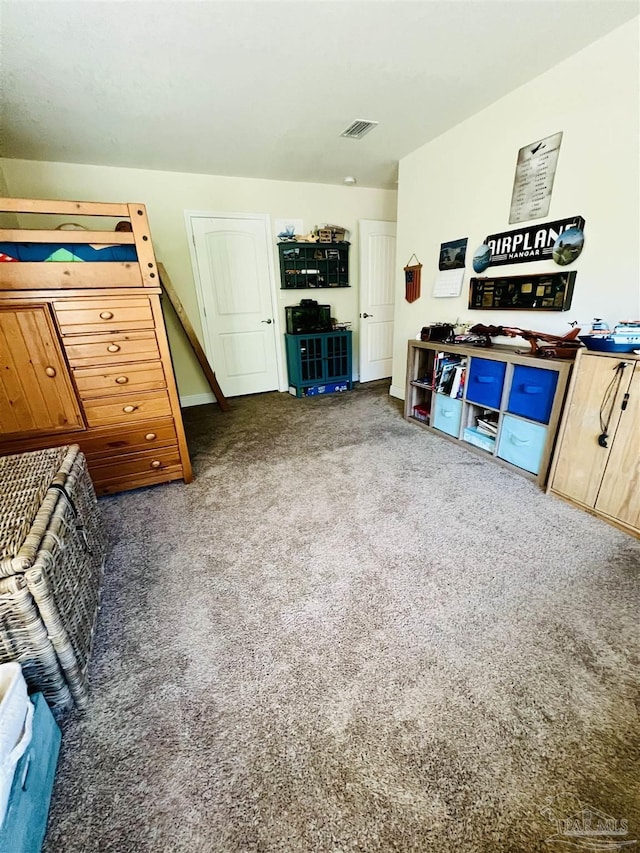 interior space featuring dark colored carpet