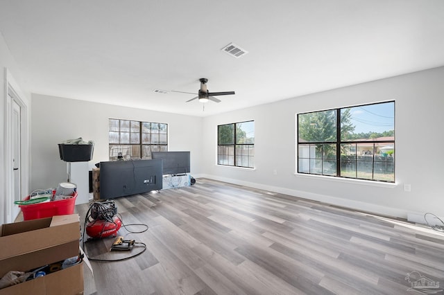 interior space featuring ceiling fan and light hardwood / wood-style floors