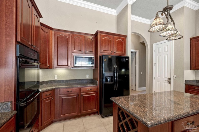 kitchen featuring black appliances, arched walkways, crown molding, dark stone counters, and light tile patterned floors
