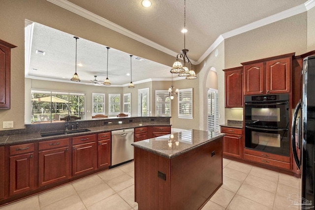 kitchen with black appliances, reddish brown cabinets, a sink, a textured ceiling, and crown molding