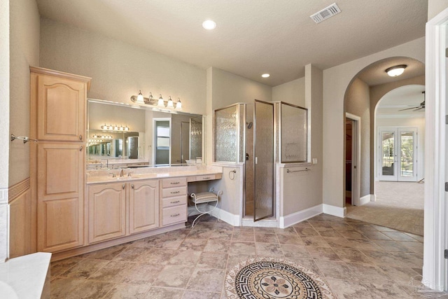 full bathroom featuring a shower stall, ceiling fan, vanity, baseboards, and recessed lighting