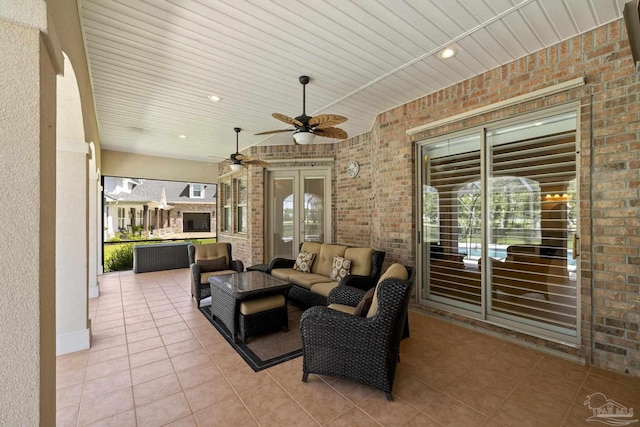 view of patio with an outdoor hangout area, ceiling fan, and french doors