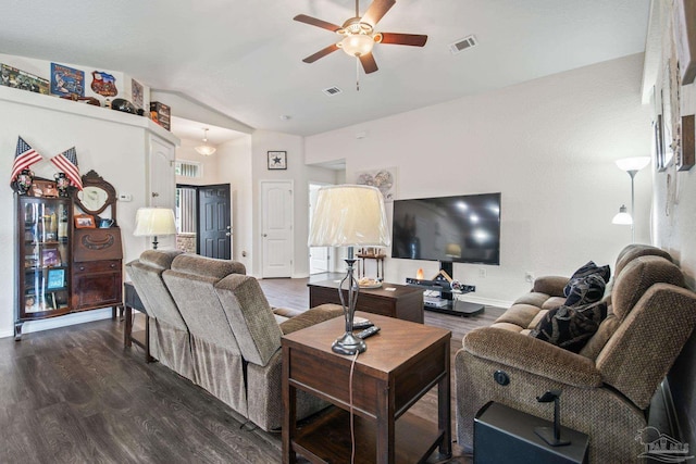 living room featuring lofted ceiling, dark wood-type flooring, and ceiling fan