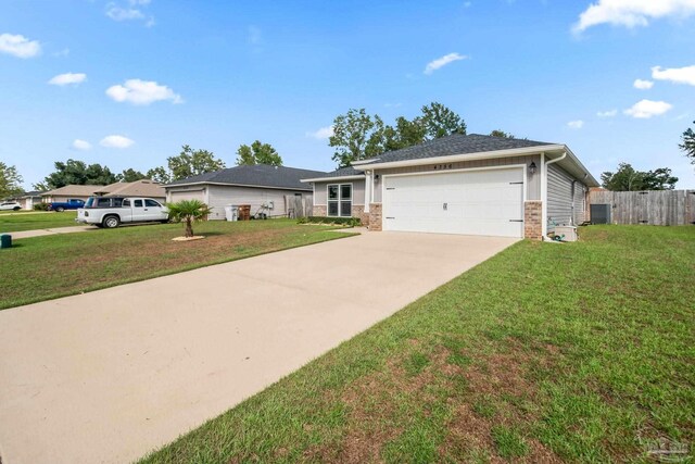 ranch-style home featuring central AC, a front yard, and a garage