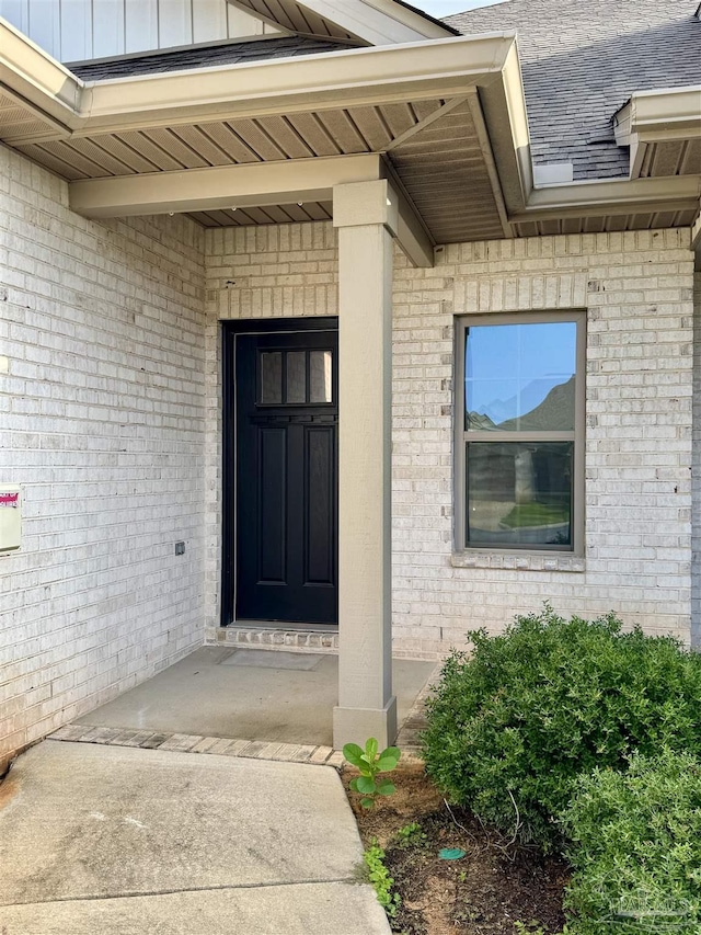 720 Brambling Ct, Cantonment, FL 32533 - property entrance with brick siding and board and batten siding
