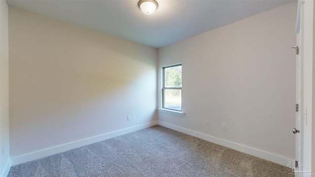 720 Brambling Ct, Cantonment, FL 32533 - carpeted empty room with baseboards