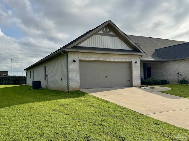 720 Brambling Ct, Cantonment, FL 32533 - view of front of property featuring brick siding, cooling unit, a garage, and a front yard