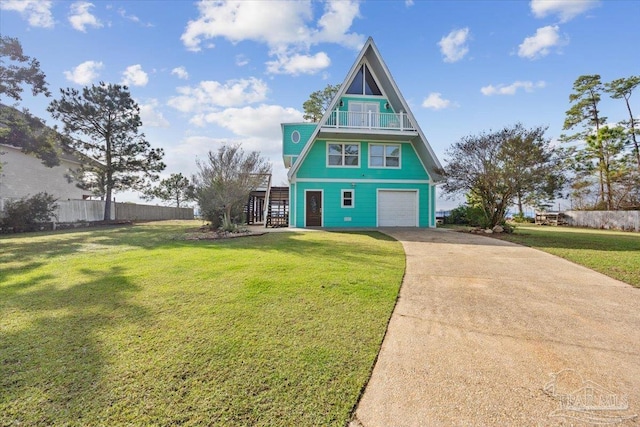 view of front of home featuring a garage and a front yard