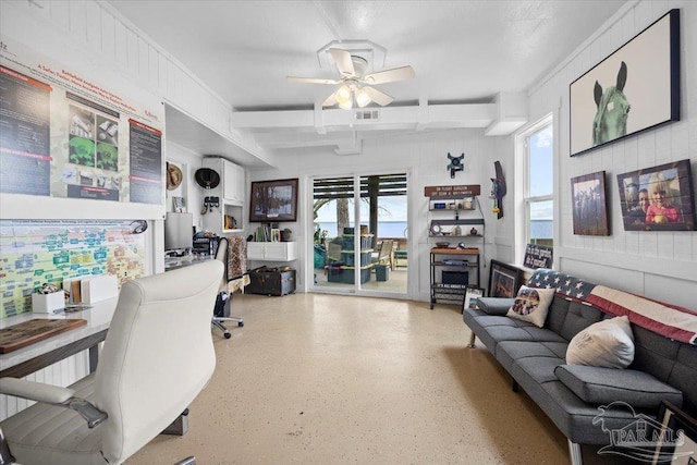 office space featuring ceiling fan and beam ceiling