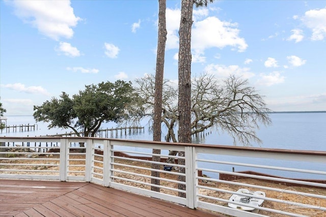 wooden terrace with a water view