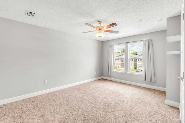 6004 Royal Port Ct, Pensacola, FL 32526 - unfurnished room featuring ceiling fan, light colored carpet, a textured ceiling, and a smoke detector