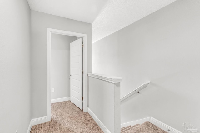 6004 Royal Port Ct, Pensacola, FL 32526 - hall with an upstairs landing and carpet flooring