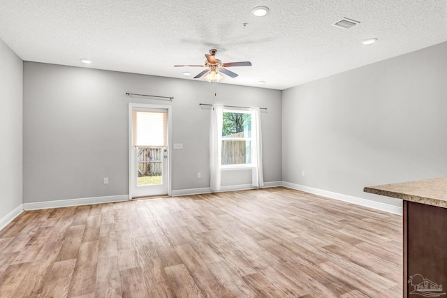 6004 Royal Port Ct, Pensacola, FL 32526 - unfurnished room featuring ceiling fan, light wood finished floors, a textured ceiling, and recessed lighting
