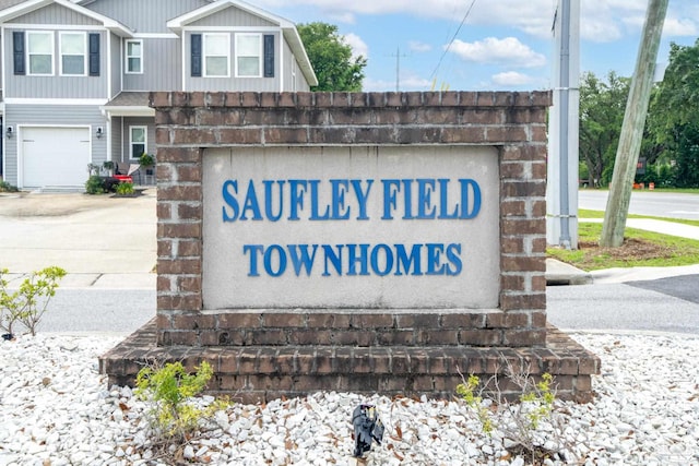 6004 Royal Port Ct, Pensacola, FL 32526 - community sign with an attached garage