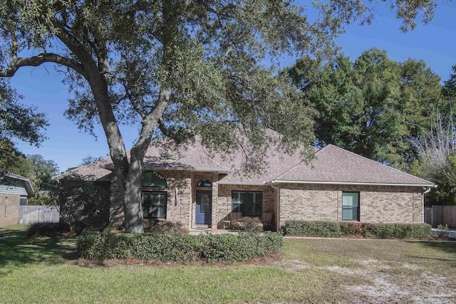 view of front of home with a front yard