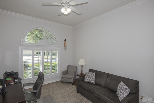 carpeted home office featuring ceiling fan and crown molding