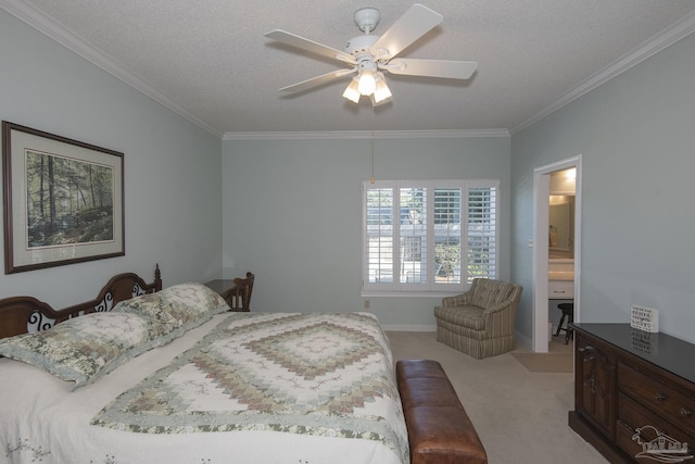 bedroom featuring ensuite bath, ceiling fan, light colored carpet, a textured ceiling, and ornamental molding