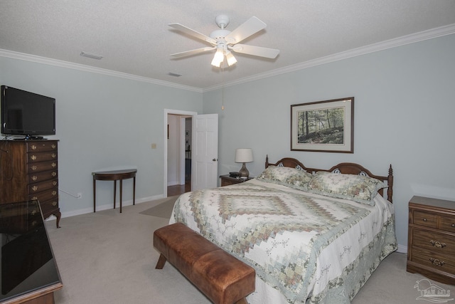 carpeted bedroom with a textured ceiling, ceiling fan, and crown molding