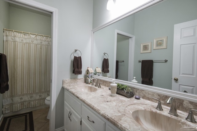 bathroom featuring tile patterned flooring, vanity, toilet, and a shower with shower curtain