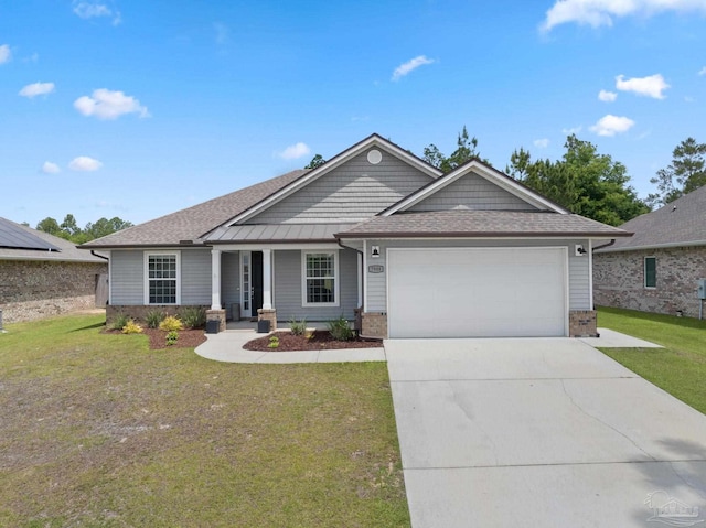 7908 Majestic Cypress Dr, Milton, FL 32583 - ranch-style home featuring roof with shingles, an attached garage, a front yard, concrete driveway, and covered porch