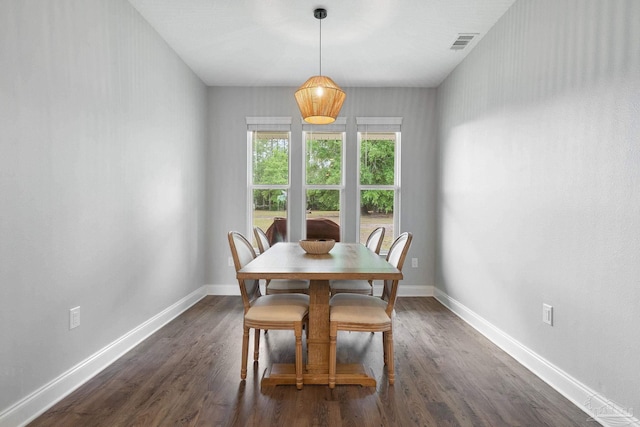 7908 Majestic Cypress Dr, Milton, FL 32583 - dining room featuring baseboards, dark wood finished floors, and visible vents
