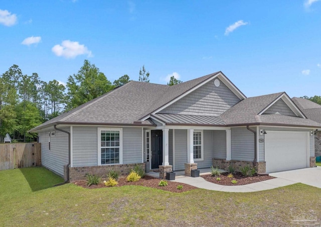 7908 Majestic Cypress Dr, Milton, FL 32583 - view of front of home featuring a garage, fence, covered porch, a front yard, and concrete driveway