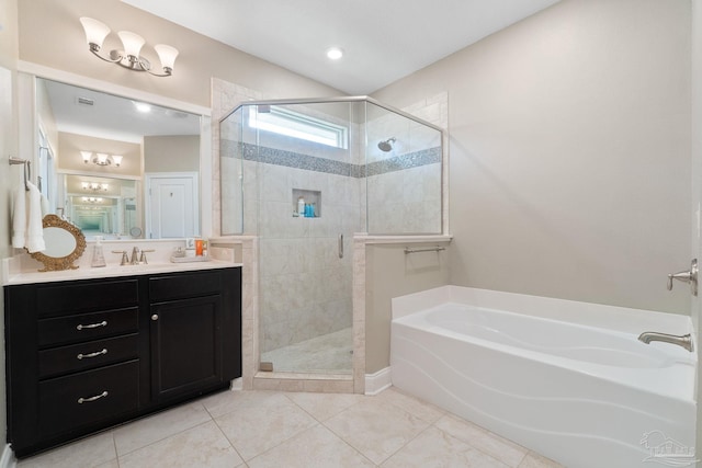 7908 Majestic Cypress Dr, Milton, FL 32583 - bathroom with a garden tub, vanity, visible vents, tile patterned floors, and a shower stall