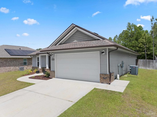 7908 Majestic Cypress Dr, Milton, FL 32583 - single story home with a garage, a front lawn, central AC, fence, and driveway