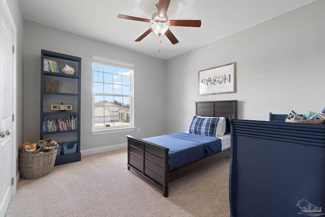 7908 Majestic Cypress Dr, Milton, FL 32583 - bedroom with carpet floors, baseboards, and ceiling fan