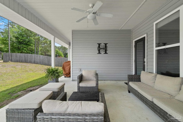 7908 Majestic Cypress Dr, Milton, FL 32583 - view of patio with fence, a ceiling fan, and an outdoor hangout area