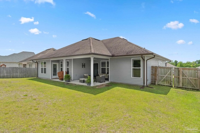 7908 Majestic Cypress Dr, Milton, FL 32583 - rear view of property featuring ceiling fan, a patio, a fenced backyard, a gate, and a yard
