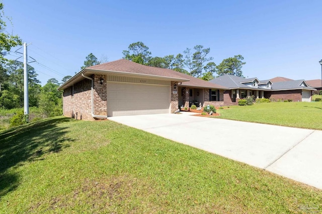 ranch-style house with brick siding, an attached garage, a front lawn, and concrete driveway