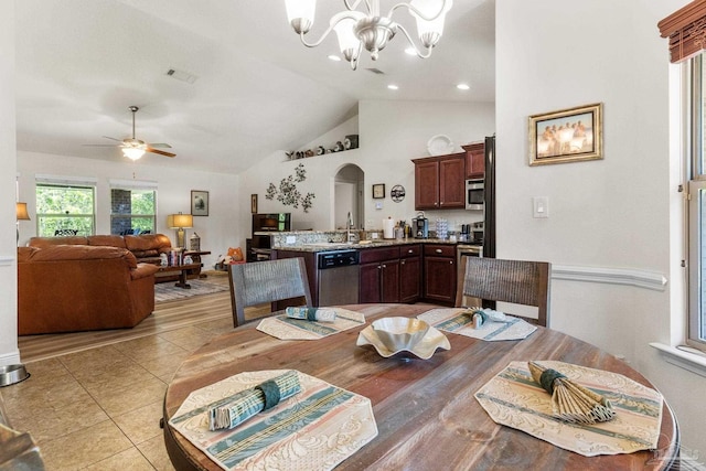 dining space with recessed lighting, visible vents, arched walkways, light tile patterned flooring, and ceiling fan with notable chandelier