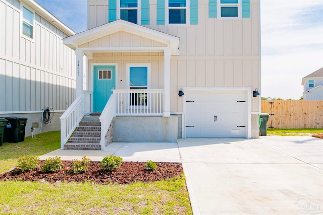 property entrance featuring a porch and a garage