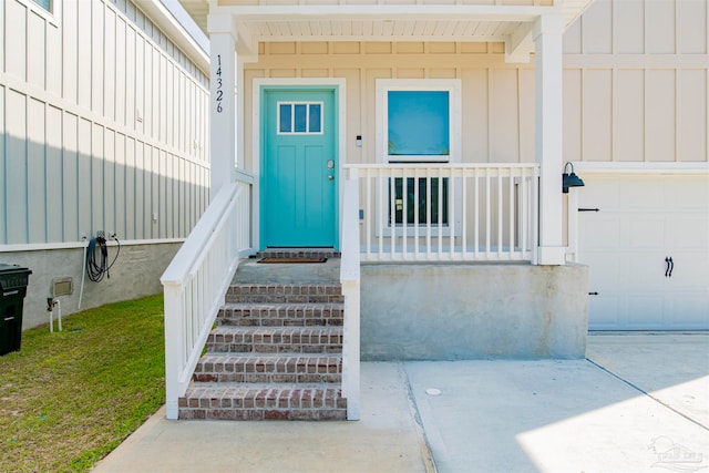 property entrance with a garage