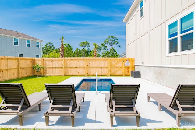 view of patio / terrace featuring a fenced in pool