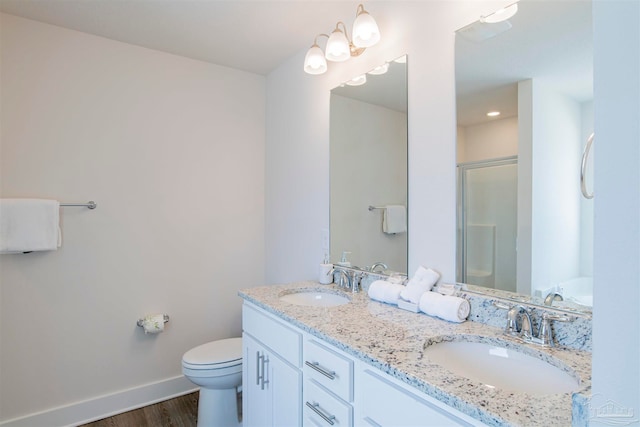 full bathroom with vanity, shower with separate bathtub, toilet, and wood-type flooring